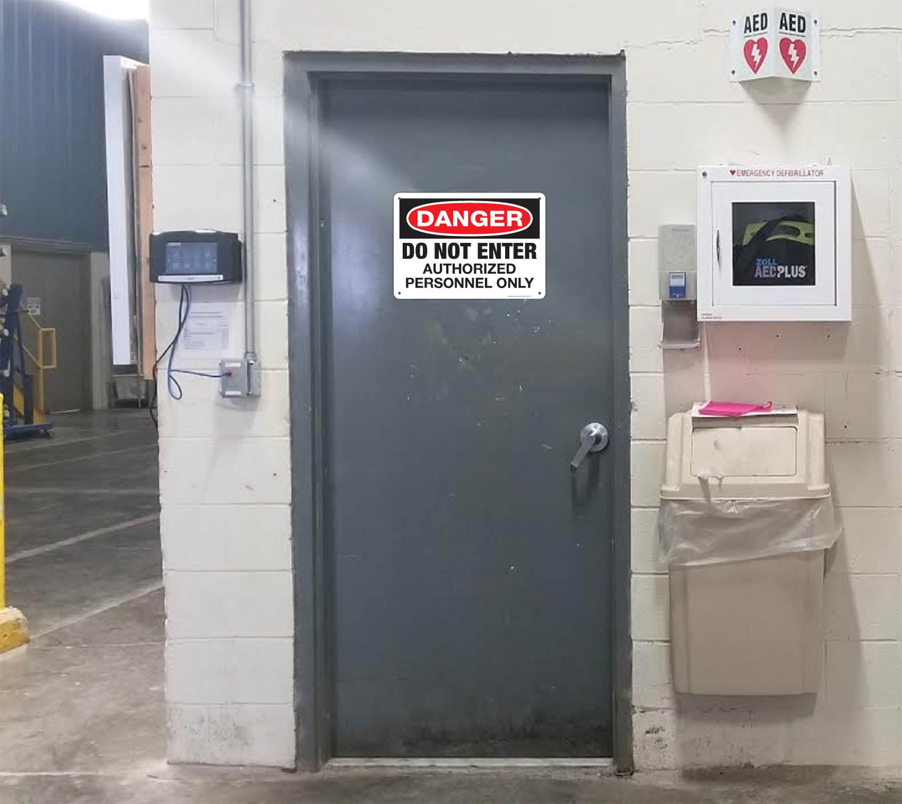 Danger do not enter authorized personnel only sign.  Sign installed on door.