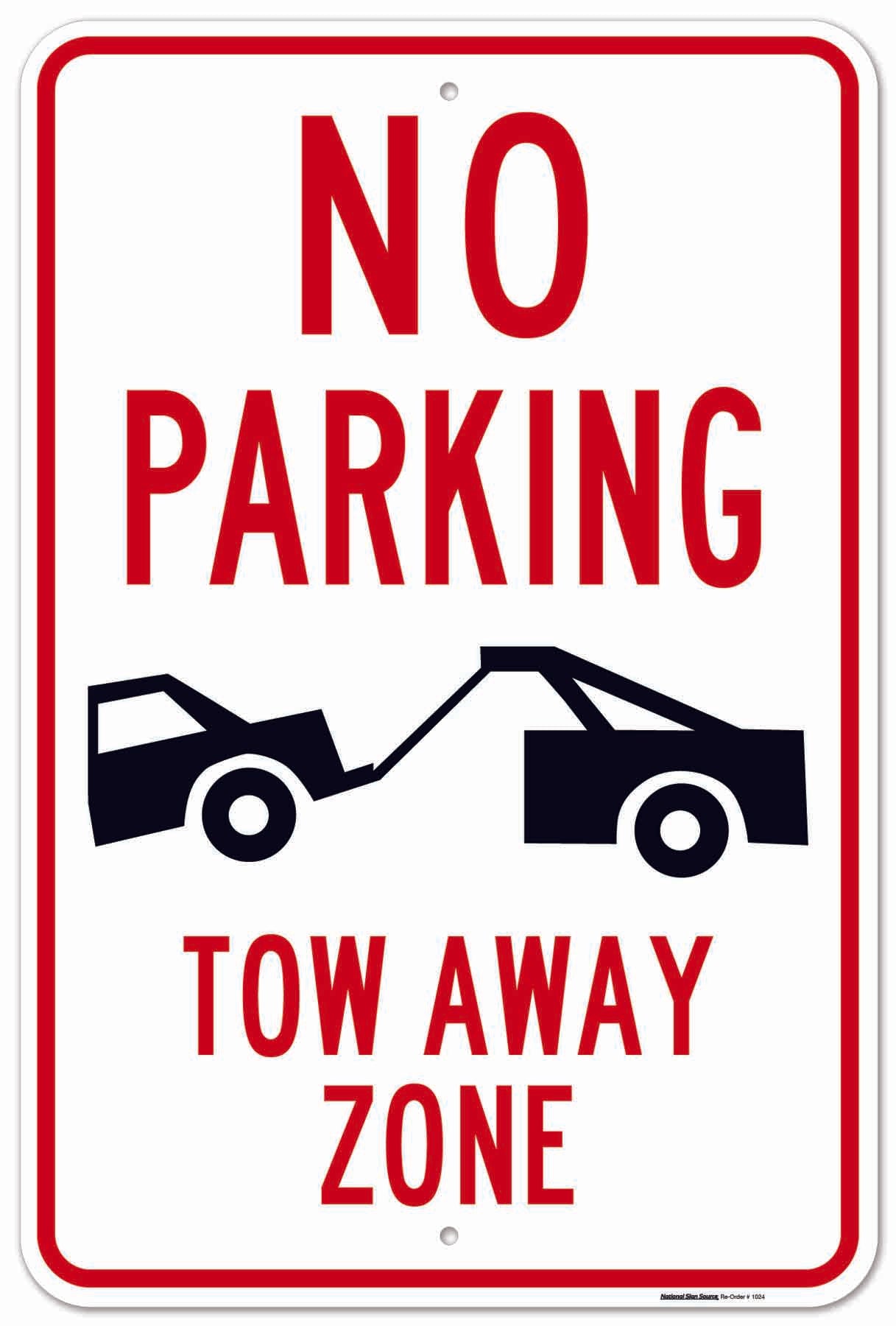 No parking tow away zone sign. Aluminum sign with car being towed away by tow truck image. Reflective aluminum no parking sign