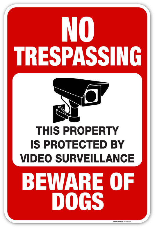 No trespassing signs that read, "NO TRESPASSING, THIS PROPERTY IS PROTECTED BY VIDEO SURVEILLANCE, BEWARE OF DOGS."  
